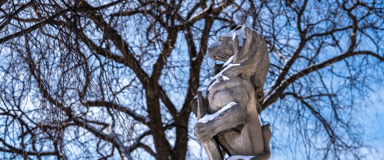 One of the carved Bedford-stone lions guarding the entrance of the Charles S. Pillsbury Mansion at 100 East 22nd Street in Minneapolis, cut by the sculptor Charles S. Wells.