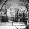 Period photograph: the Charles S. Pillsbury Mansion in winter during its years as Passavant Hall of the Northwestern Lutheran Theological Seminary, captioned 1966