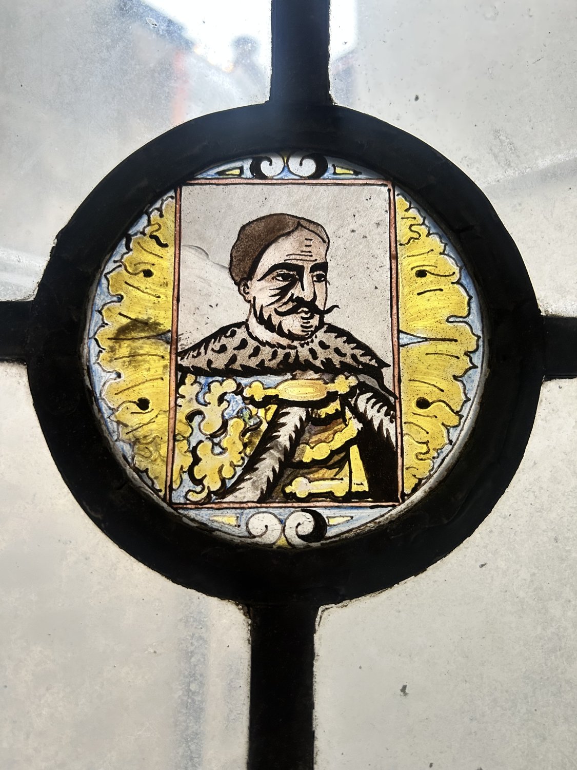 Standing figure in stained glass