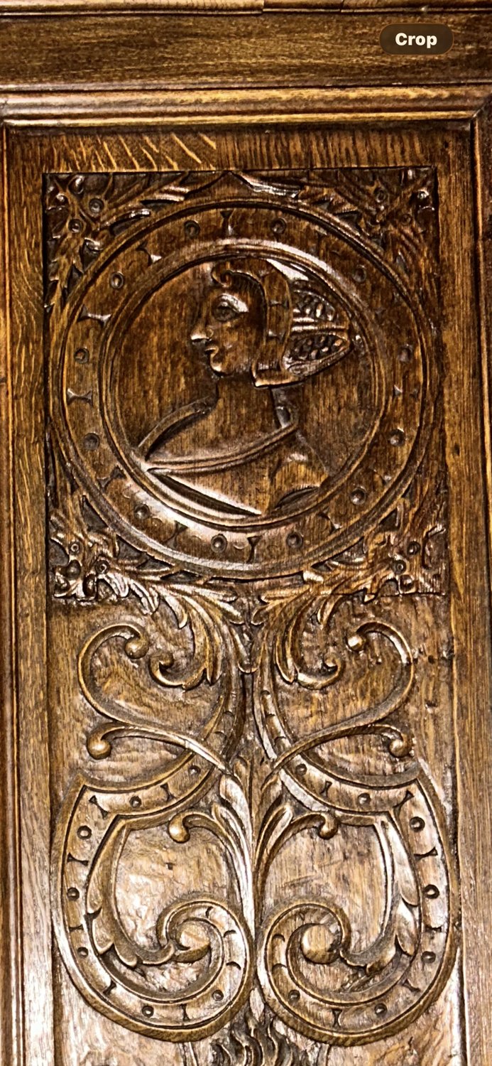 Carved Tudor oak relief