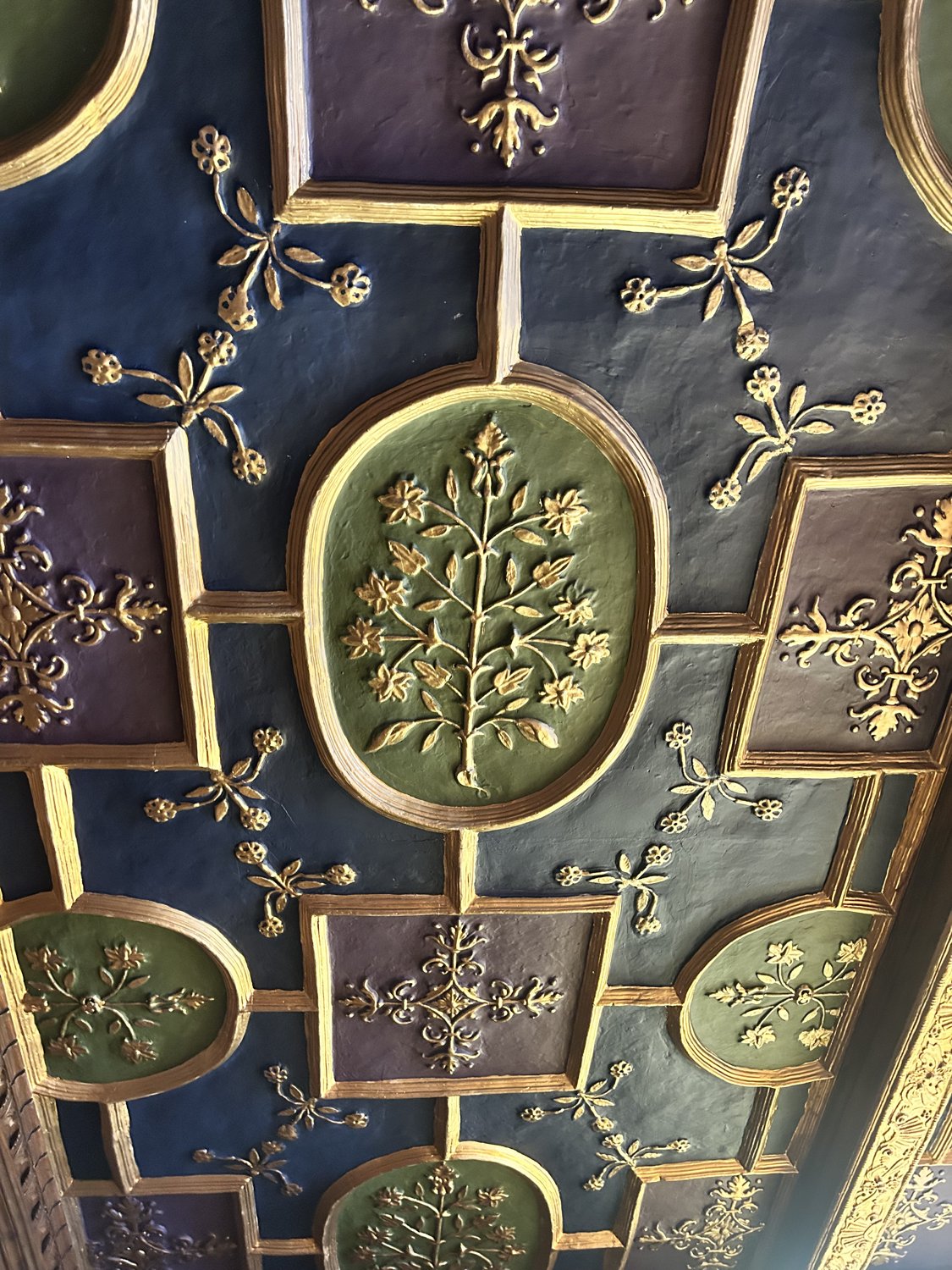 Gilded Tudor ceiling rosettes