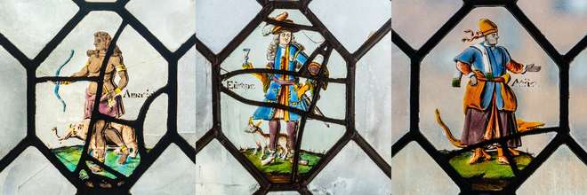 Three painted-glass panels in the Pillsbury Mansion windows labeled America, Europa and Africa, each a single costumed figure inside an octagonal leaded frame